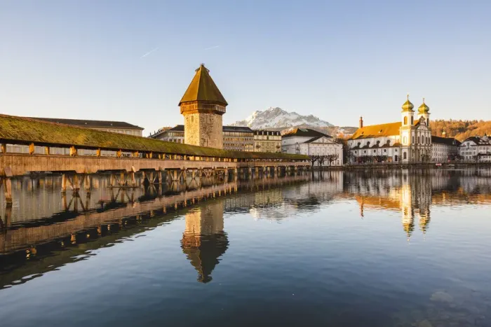 Framed Print : Lucerne, Switzerland. KapellbrAocke (Chapel Bridge), Jesuit church and mount Pilatus