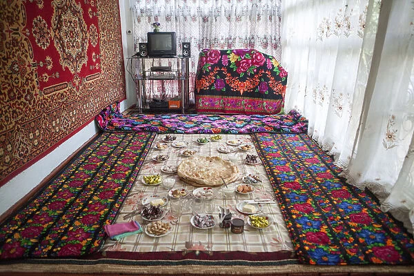 Lunch laid out on a tablecloth on the floor, at a homestay on the Pamir Highway