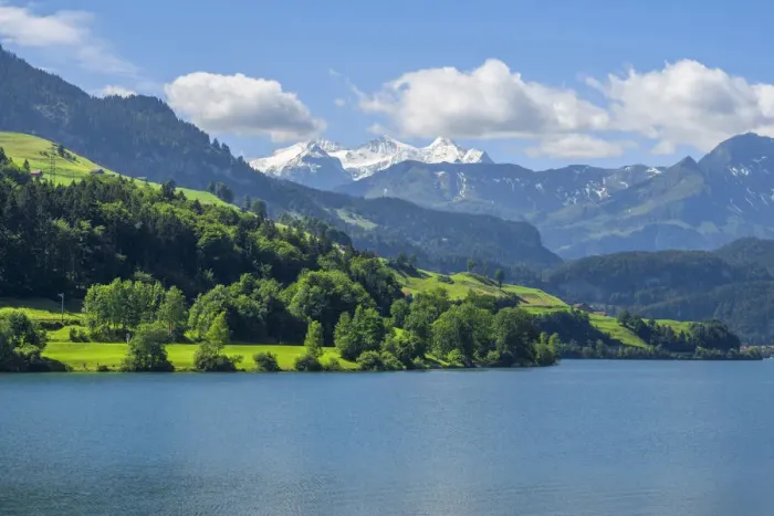 Framed Print : Lungerner lake with Bernes Alps, Canton Obwalden, Switzerland