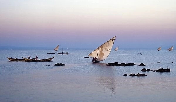 Luo fishing boats leave the eastern lakeshore of Lake