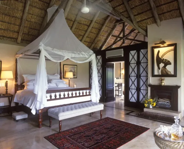 Framed Print : Luxuriously appointed bedroom in one of Framed Print : Luxuriously appointed bedroom in one of