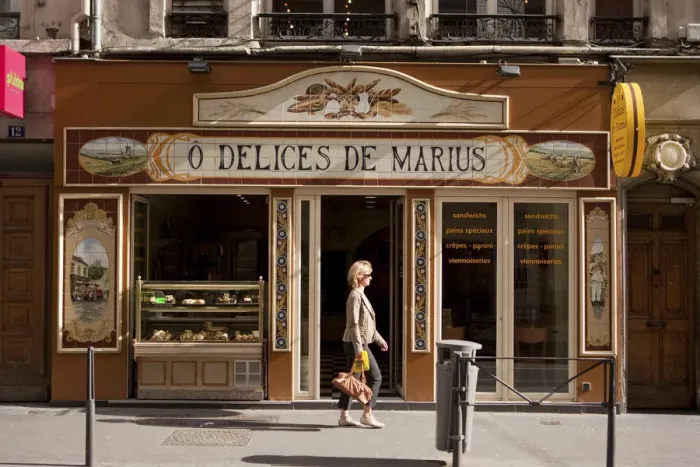 Framed Print : Lyon, France; A street scene in front of a bakery in Lyon France