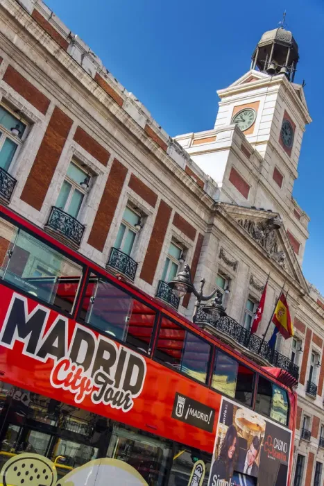 Framed Print : Madrid city tour red bus in Puerta del Sol, Madrid, Comunidad de Madrid, Spain Framed Print : Madrid city tour red bus in Puerta del Sol, Madrid, Comunidad de Madrid, Spain