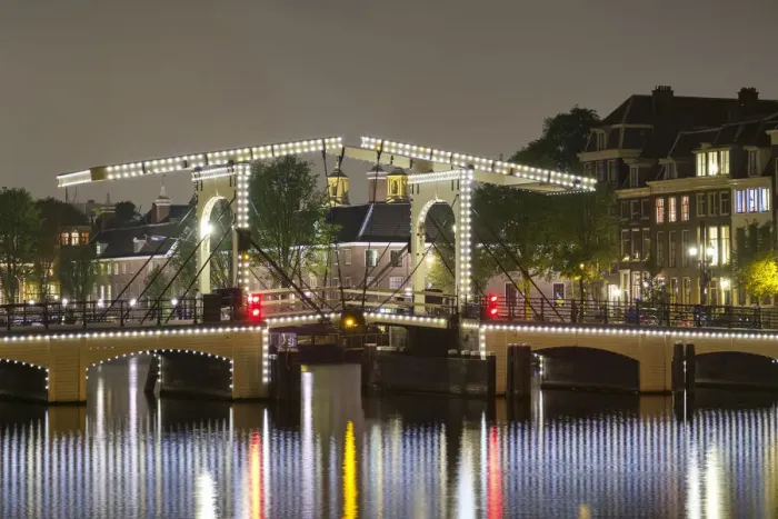 Framed Print : Magere Brug over the river Amstel illuminated at night, Amsterdam, North Holland Framed Print : Magere Brug over the river Amstel illuminated at night, Amsterdam, North Holland