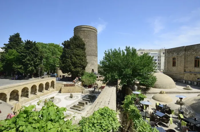 Framed Print : The Maiden Tower (Qiz Qalasi), a 12th century monument in the Old City, and Haji Bani Framed Print : The Maiden Tower (Qiz Qalasi), a 12th century monument in the Old City, and Haji Bani