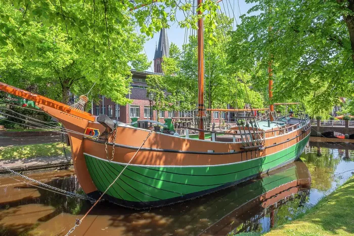 Framed Print : Main canal with sailboat at Papenburg, Emsland, Lower Saxony, Germany Framed Print : Main canal with sailboat at Papenburg, Emsland, Lower Saxony, Germany