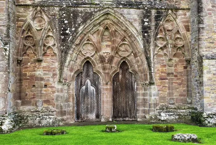 Framed Print : The main entrance in the west facade of the Tintern Abbey church, founded in 1131 by Cistercian monks, Monmouthshire, Wales Framed Print : The main entrance in the west facade of the Tintern Abbey church, founded in 1131 by Cistercian monks, Monmouthshire, Wales
