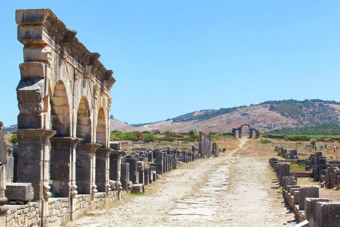 Framed Print : The main road (Decumanus Maximus) of the ancient Roman ruins of Volubilis, near Meknes, Morocco Framed Print : The main road (Decumanus Maximus) of the ancient Roman ruins of Volubilis, near Meknes, Morocco