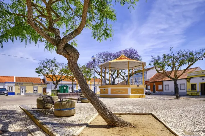 Framed Print : The main square of the fishing village of Rosario with the traditional bandstand, Moita Framed Print : The main square of the fishing village of Rosario with the traditional bandstand, Moita