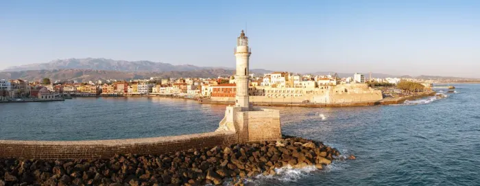 Framed Print : Majestic lighthouse overlooking the old harbour and colorful town of Chania, Crete Framed Print : Majestic lighthouse overlooking the old harbour and colorful town of Chania, Crete