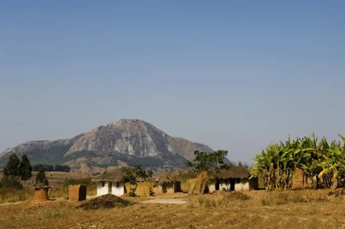 Framed Print : Malawi, Dedza. Grass-roofed houses in a rural village in the Dedza region Framed Print : Malawi, Dedza. Grass-roofed houses in a rural village in the Dedza region