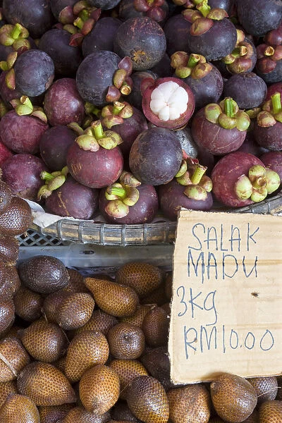 Malaysia, local fruits in a market stall