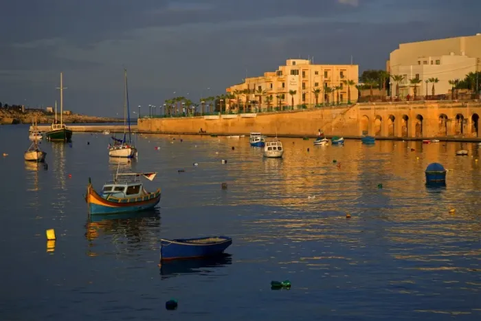 Framed Print : Malta, Europe; Colourful traditional wooden boats in the placid bay of the former fishing village Framed Print : Malta, Europe; Colourful traditional wooden boats in the placid bay of the former fishing village