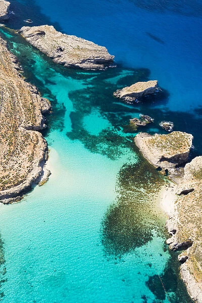 Malta, Gozo Region, Comino. Aerial view of the azure coloured waters of the Blue Lagoon