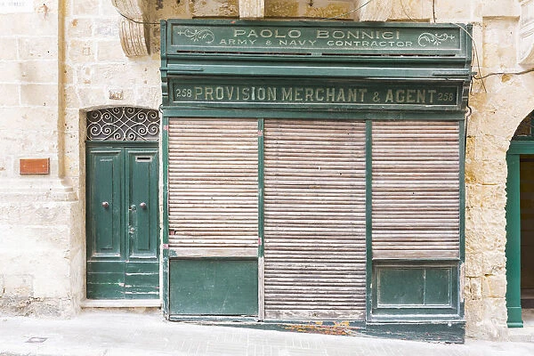 Malta, South Eastern Region, Valletta. Traditional shop in historic Valletta