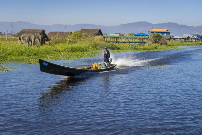 Framed Print : Man going on Inle Lake by boat, Lake Inle, Nyaungshwe Township, Taunggyi District Framed Print : Man going on Inle Lake by boat, Lake Inle, Nyaungshwe Township, Taunggyi District