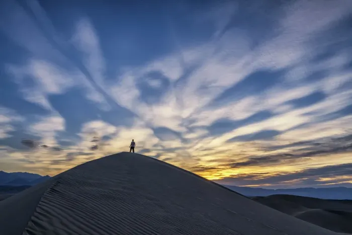 Framed Print : Man on Mesquite Dunes at Sunrise, Death Valley National Park, California, USA Framed Print : Man on Mesquite Dunes at Sunrise, Death Valley National Park, California, USA