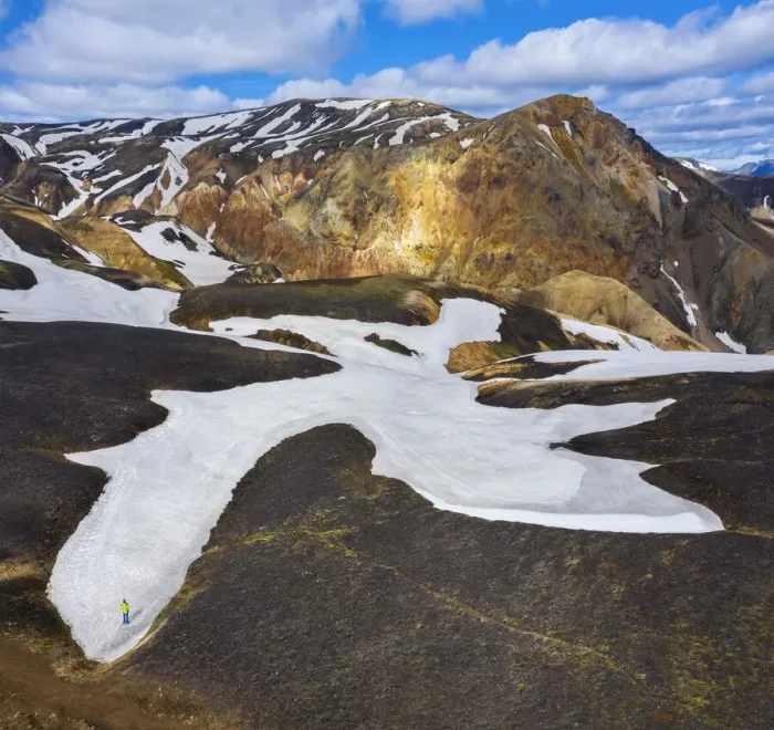 Framed Print : a man that observes Landmannalaugar mountains during summer, Landmannalaugar, Highlands Framed Print : a man that observes Landmannalaugar mountains during summer, Landmannalaugar, Highlands