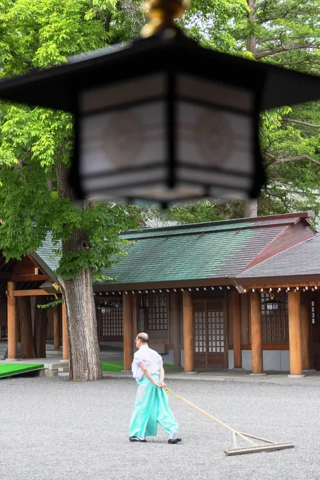 Framed Print : Man raking stones at Jingu Shinto Shrine, Sapporo, Hokkaido, Japan Framed Print : Man raking stones at Jingu Shinto Shrine, Sapporo, Hokkaido, Japan
