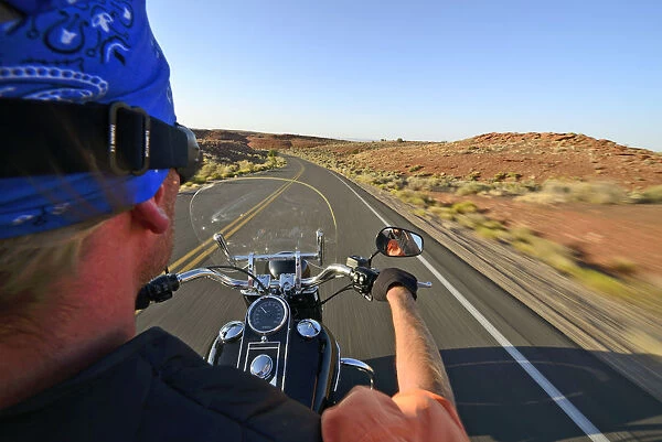 Man riding his Harley near Flagstaff, Arizona, USA