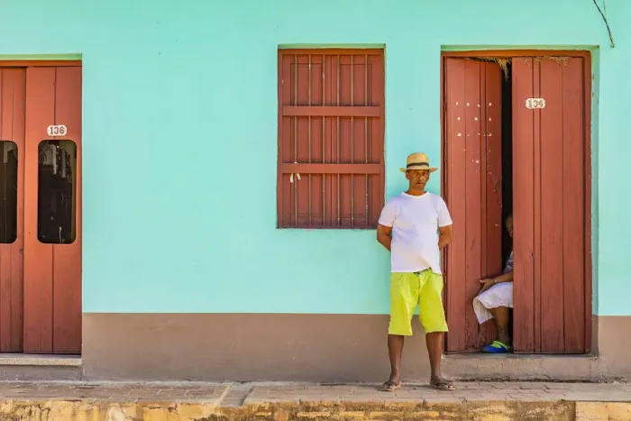 Framed Print : A man standing outside his house in a street in Trinidad, Sancti Spiritus, Cuba Framed Print : A man standing outside his house in a street in Trinidad, Sancti Spiritus, Cuba