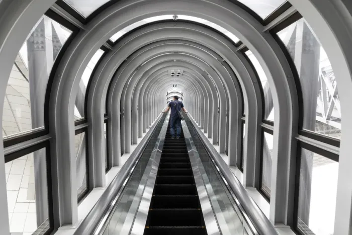 Framed Print : A man takes the escalator up the Umeda Sky building, Osaka, Kansai, Japan Framed Print : A man takes the escalator up the Umeda Sky building, Osaka, Kansai, Japan