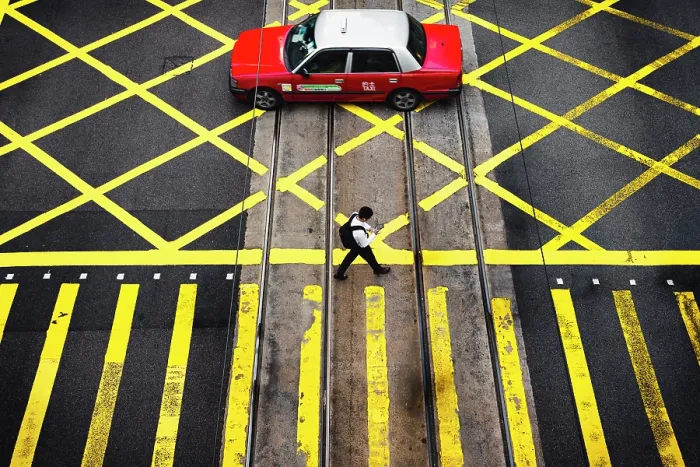 Framed Print : A man and a taxi on pedrestian crossing, Central, Hong Kong, China