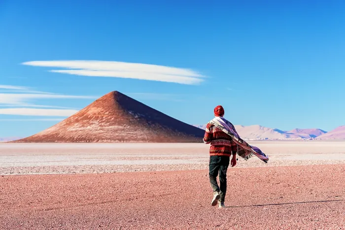 Framed Print : Man walking toward Arita Cone in the dry Salar de Arizaro, Tolar Grande, Puna, Argentina. (MR)