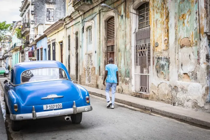 Framed Print : A man walking in a narrow street in La Habana Vieja (Old Town), Havana, Cuba Framed Print : A man walking in a narrow street in La Habana Vieja (Old Town), Havana, Cuba