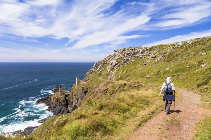 Framed Print : A man walking near Botallack Mine, Penzance, Cornwall, England, UK