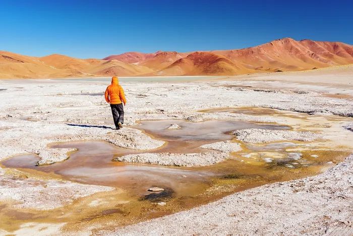 Framed Print : Man walking near fumaroles at Galan Volcano, Puna, Catamarca, Argentina. (MR) Framed Print : Man walking near fumaroles at Galan Volcano, Puna, Catamarca, Argentina. (MR)