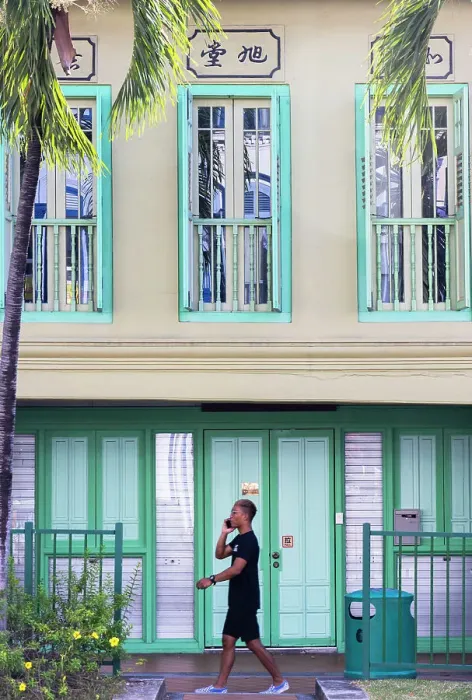 Framed Print : Man walking past traditional Peranakan shophouse, Tanjong Pagar, Singapore Framed Print : Man walking past traditional Peranakan shophouse, Tanjong Pagar, Singapore