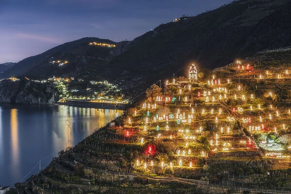 Manarola nativity scene, behind Corniglia and San Bernardino, Cinque Terre National Park, La Spezia province, Liguria, Italy