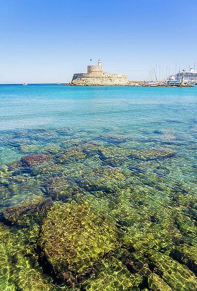 Mandraki Marina and Port looking towards Saint Nicholas Fortress, Rhodes Town, Rhodes, Dodecanese Islands, Greece
