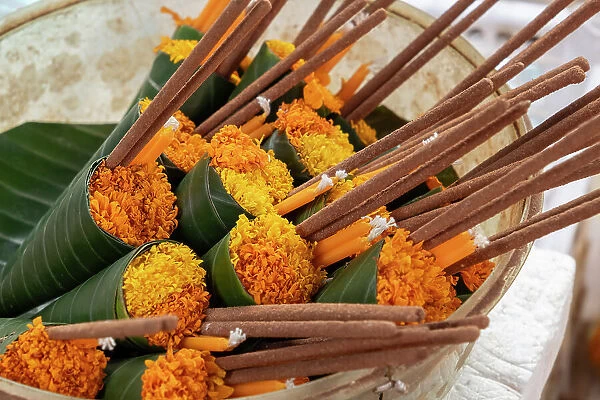 Marigold offering at a temple in Luang Prabang (ancient capital of Laos on the Mekong river), Laos