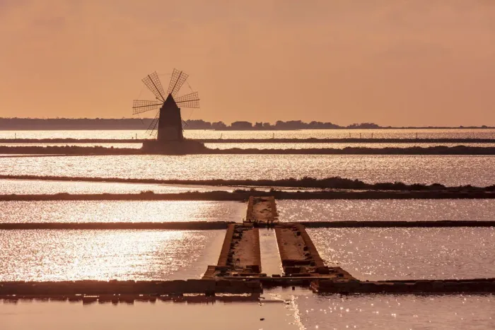 Framed Print : Marsala, Sicily. Windmills reflecting at sunset in the saltern between Marsala Framed Print : Marsala, Sicily. Windmills reflecting at sunset in the saltern between Marsala