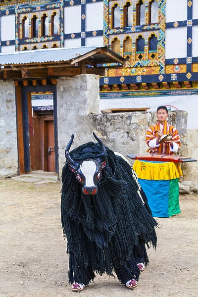 Masked dancer at a local festival in Paro District, Bhutan