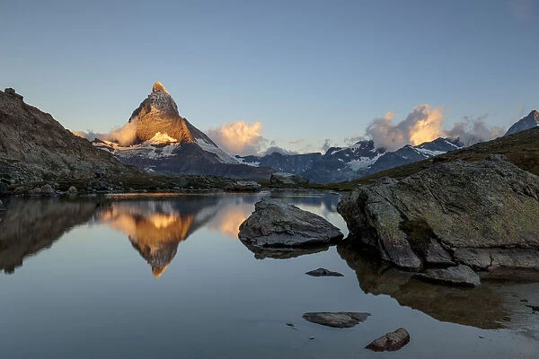 Matterhorn with Lake Riffel at dawn, Valais, Switzerland, Europe