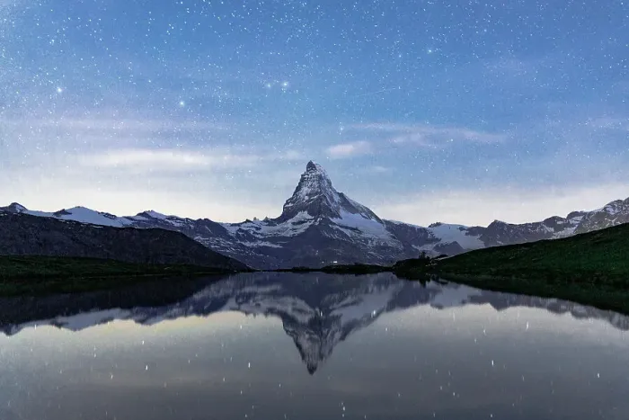 Framed Print : Matterhorn mountain peak reflected in Stellisee lake under a romantic starry night sky, Zermatt, Valais Canton, Switzerland Framed Print : Matterhorn mountain peak reflected in Stellisee lake under a romantic starry night sky, Zermatt, Valais Canton, Switzerland