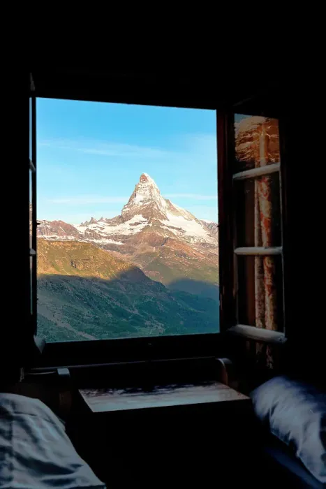 Framed Print : Matterhorn peak at dawn view through a window of a mountain hut, Zermatt, Canton of Valais, Switzerland Framed Print : Matterhorn peak at dawn view through a window of a mountain hut, Zermatt, Canton of Valais, Switzerland