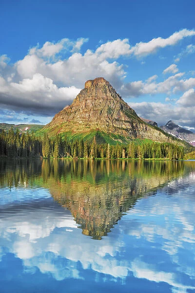 Two Medicine Lake with reflection of Sinopah Mountain - USA, Montana