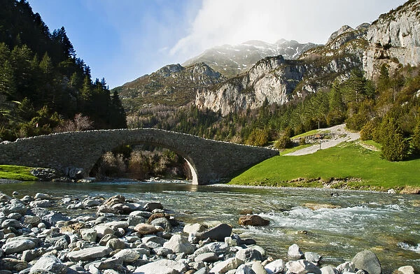 Medieval bridge in Bujaruelo. Ordesa y Monte Perdido National Park, Pyrenees, Spain