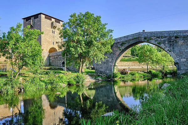 The medieval bridge of Ucanha, dating back to the 12th century, over the Varosa river. The Tower at one of the entrances was the first in the country to demand toll collection to enter the dominion of the monastery of Santa Maria de Salzedas