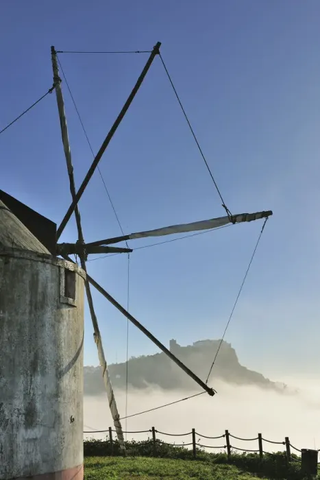 Framed Print : The medieval castle of Palmela and a windmill in a foggy morning, Portugal Framed Print : The medieval castle of Palmela and a windmill in a foggy morning, Portugal