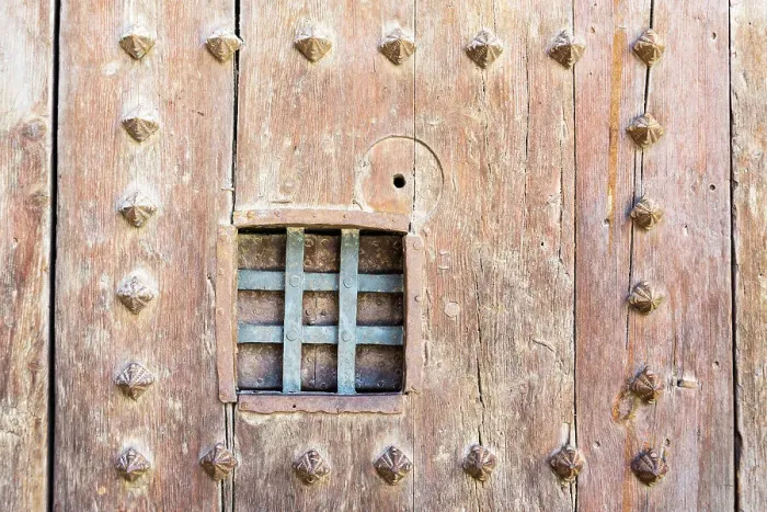 Framed Print : Medieval door with a peephole covered in metal bars, Casa Punt de Gantxo, Valencia, Spain Framed Print : Medieval door with a peephole covered in metal bars, Casa Punt de Gantxo, Valencia, Spain