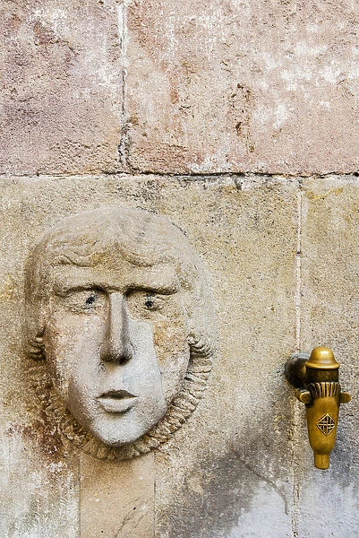 Medieval water fountain in Plaza Sant Just, Barcelona, Catalonia, Spain