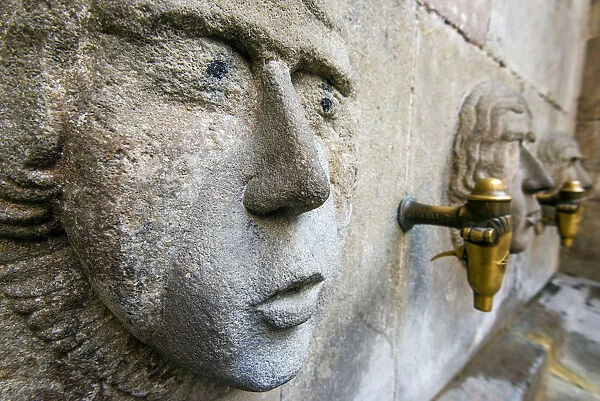 Medieval water fountain in Plaza Sant Just, Barcelona, Catalonia, Spain