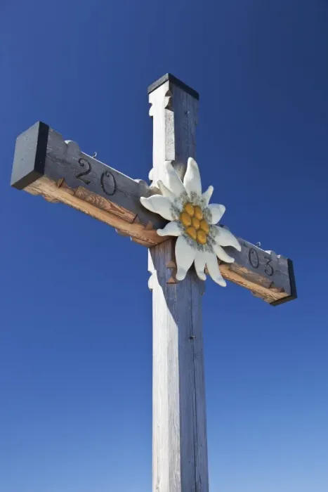 Framed Print : Memorial cross and Edelweiss flower motif on Kehlstein Peak, location of Hitlers Eagles Nest residence in Berchtesgaden, Obersalzburg