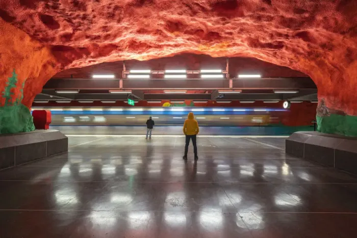 Framed Print : Men looking at artwork and paintings on rocks, Solna Centrum metro station, Stockholm Framed Print : Men looking at artwork and paintings on rocks, Solna Centrum metro station, Stockholm