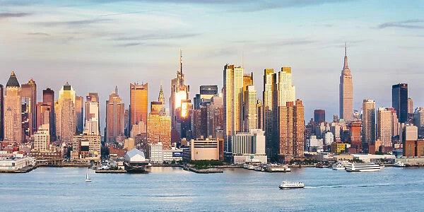 Midtown Manhattan skyline seen from across the Hudson river at sunset, New York city, USA
